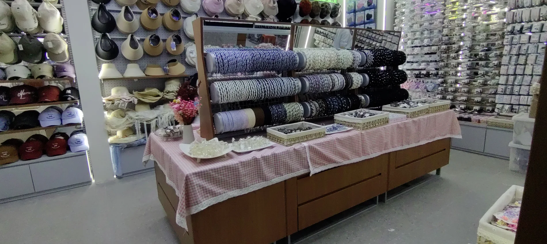Completed accessories display table with merchandise at the Dongguan Chaowushi retail store
